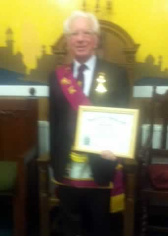 Bro McDonald with diploma